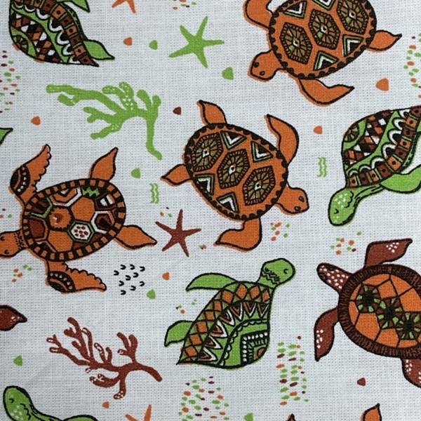 TISSU COTON IMPRIME TORTUES ORANGES THEME MER