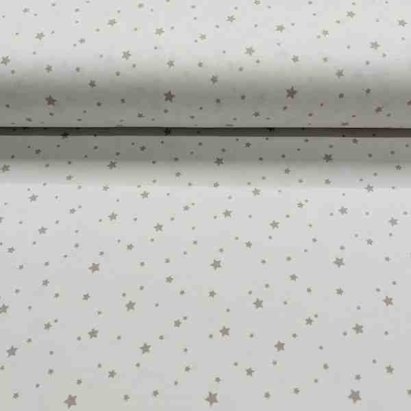 TISSU JERSEY IMPRIME ETOILE MULTI BEIGE FOND BLANC