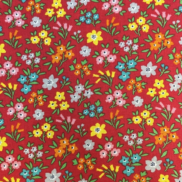 TISSU COTON IMPRIME FLEURETTE FOND ROUGE