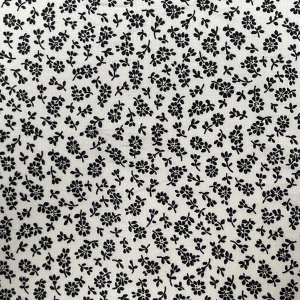 TISSU COTON PAQUERETTE NOIRE FOND BLANC