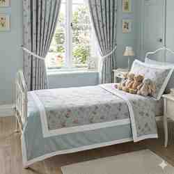 TISSU COTON IMPRIMÉ SUZANNE MOTIF ROSES FOND BLEU