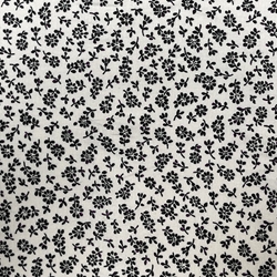 TISSU COTON PAQUERETTE NOIRE FOND BLANC