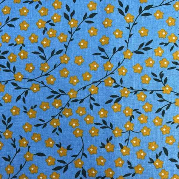 TISSU COTON IMPRIME FLEUR JAUNE FOND BLEU CIEL