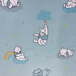 TISSU DISNEY WINNIE L OURSON FOND BLEU