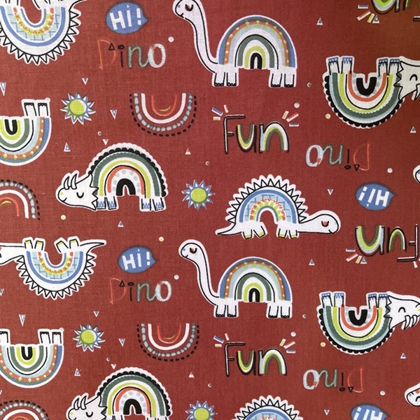 TISSU COTON IMPRIME DINOSAURE MULTI FOND ROUGE